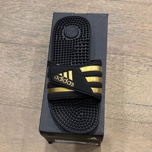 Unisex Adidas Adissage Black Slides with Gold Stripes
